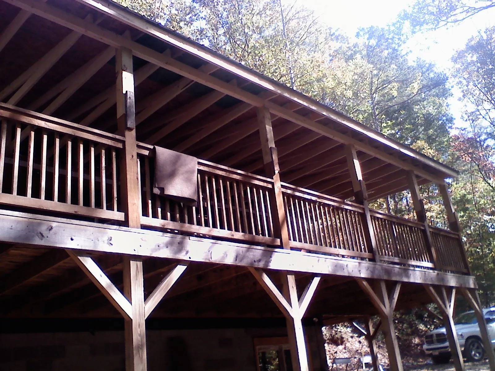 Timber framing under a new elevated porch and deck — Roof Leak Repair in Allison by Roofing Brothers